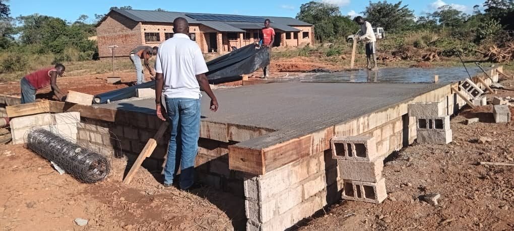 The completed floor slab curing on site